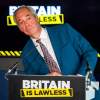 Nigel Farage, at a lectern, lurching to the right